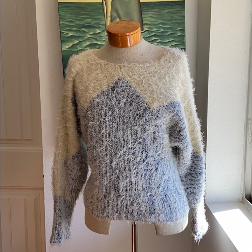 Adorable moth sweater